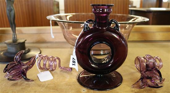 Large amethyst glass bowl, a pair of similar flower ornaments and a flask (4)(-)